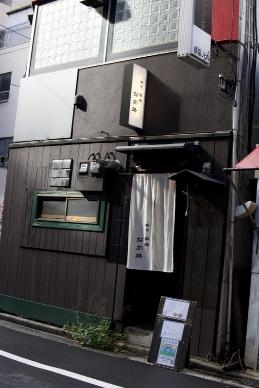 Noren fabric dividers hanging in a Kyoto alley