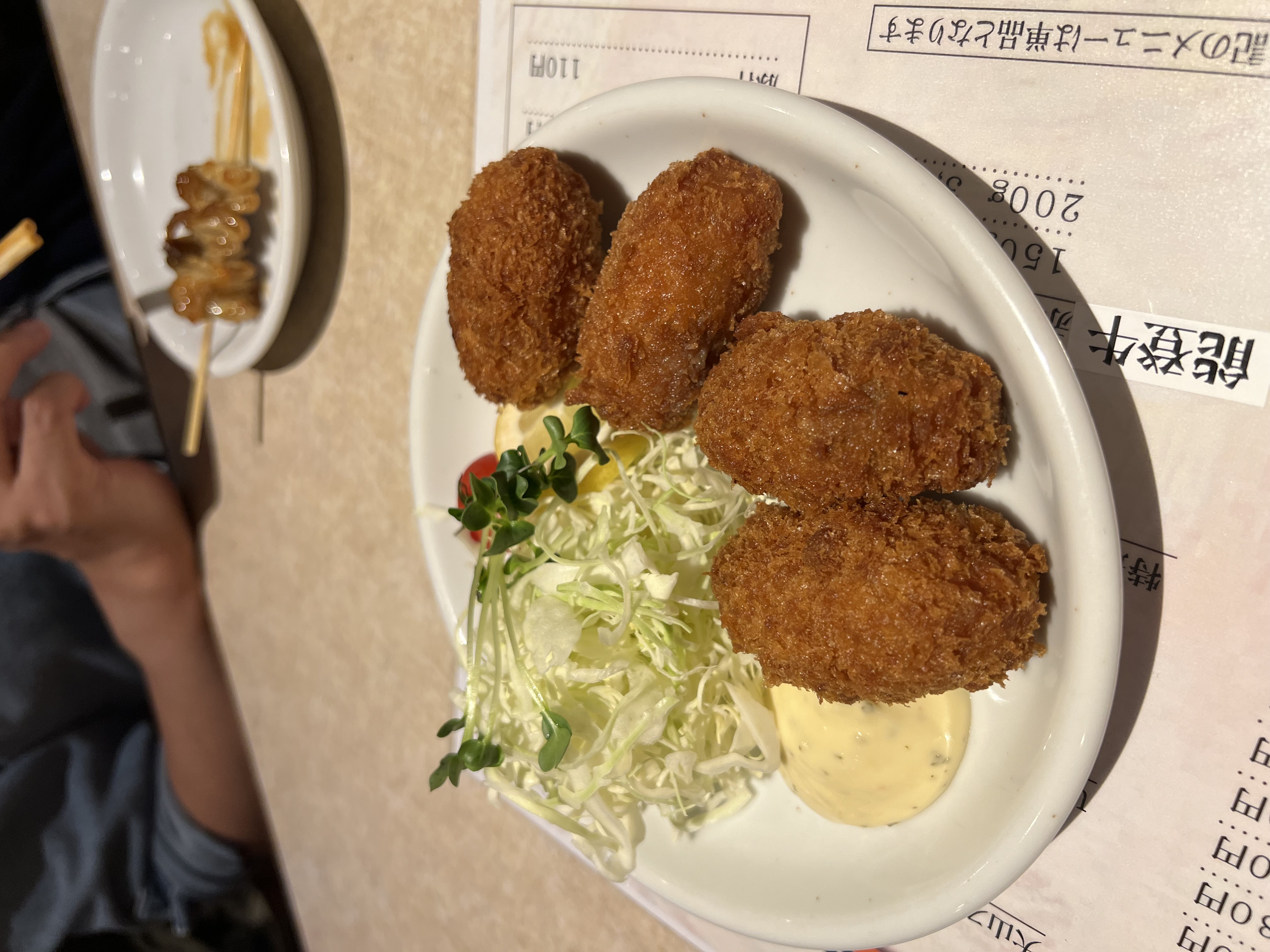 Kaki fry — deep fried oysters with shredded cabbage and Japanese mayo at Ohyama