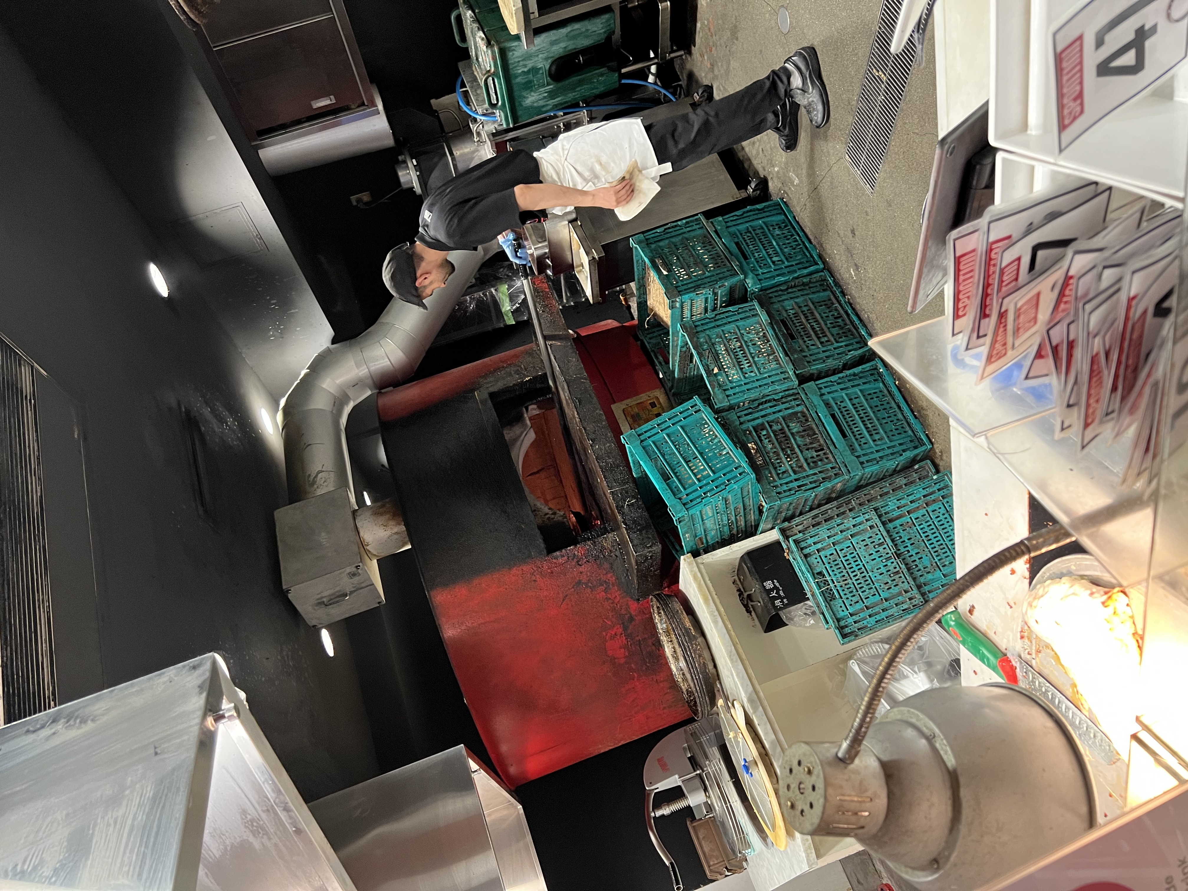 Inside the Spontini kitchen — staff working at the counter
