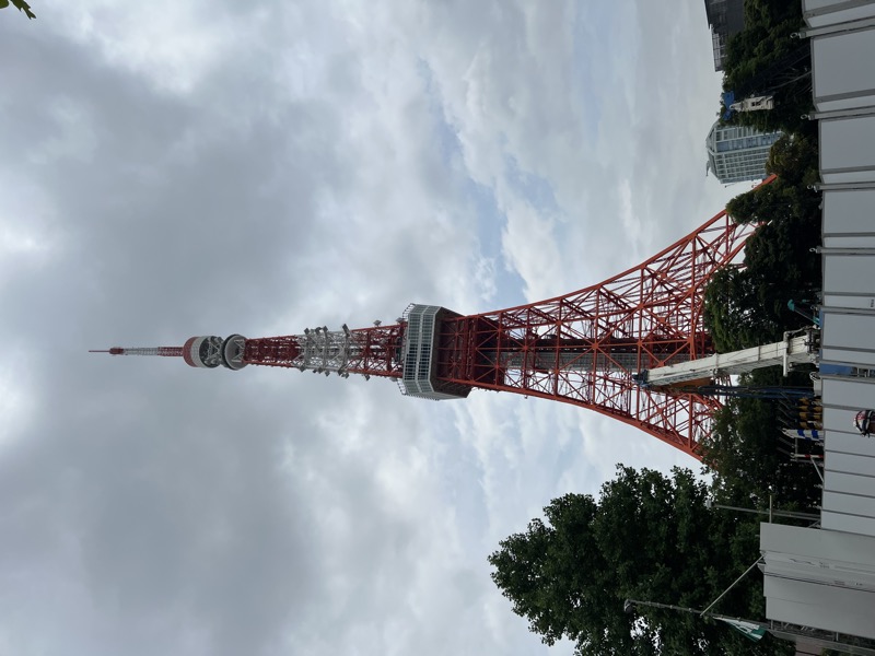 Tokyo Tower from below against grey sky