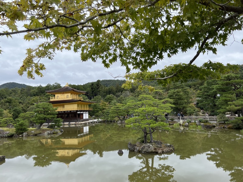 Kinkaku-ji golden pavilion reflected in pond